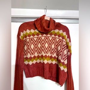 Cropped sweater with loose turtle neck